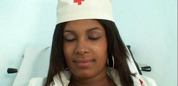  Black nurse Manuela speculum and dildo masturbation